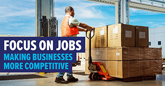 Photo of worker with text: Focus on jobs - making businesses more competitive
