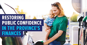 Photo of person with child with text: Restoring public confidence in the Province's finances