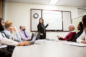 Woman leading a business meeting