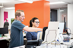 Man and woman working in an office