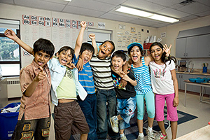 Elementary school children posing for photo at school