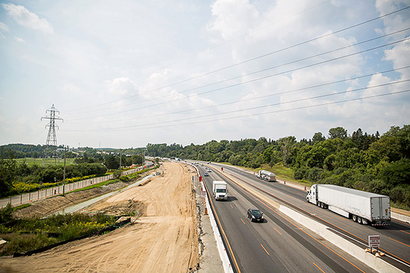 Cars and trucks driving on a highway
