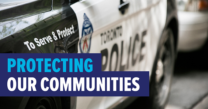 Photo of police car with text: Protecting our communities