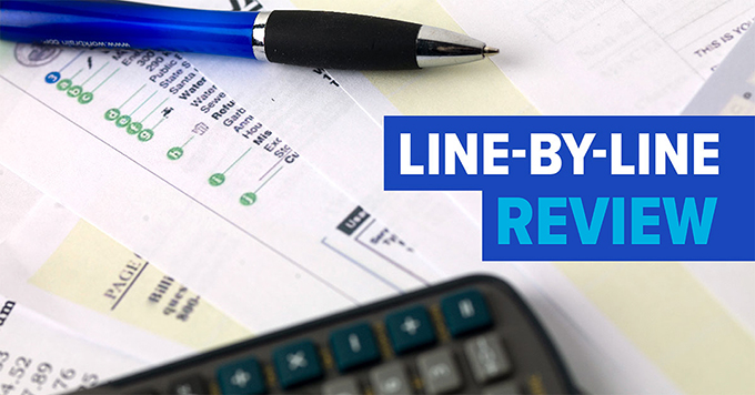 Photo of documents with text: Line-by-line review