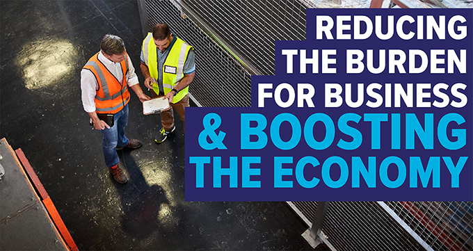 Photo of workers with text: Reducing the burden for business & boosting the economy
