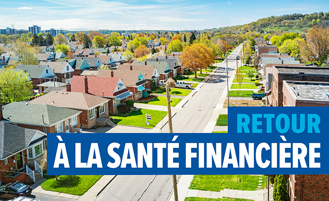 Photo d’un quartier florissant avec le texte suivant : Retour à la santé financière