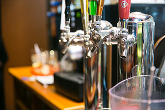 Photo of a beverage dispenser in a bar