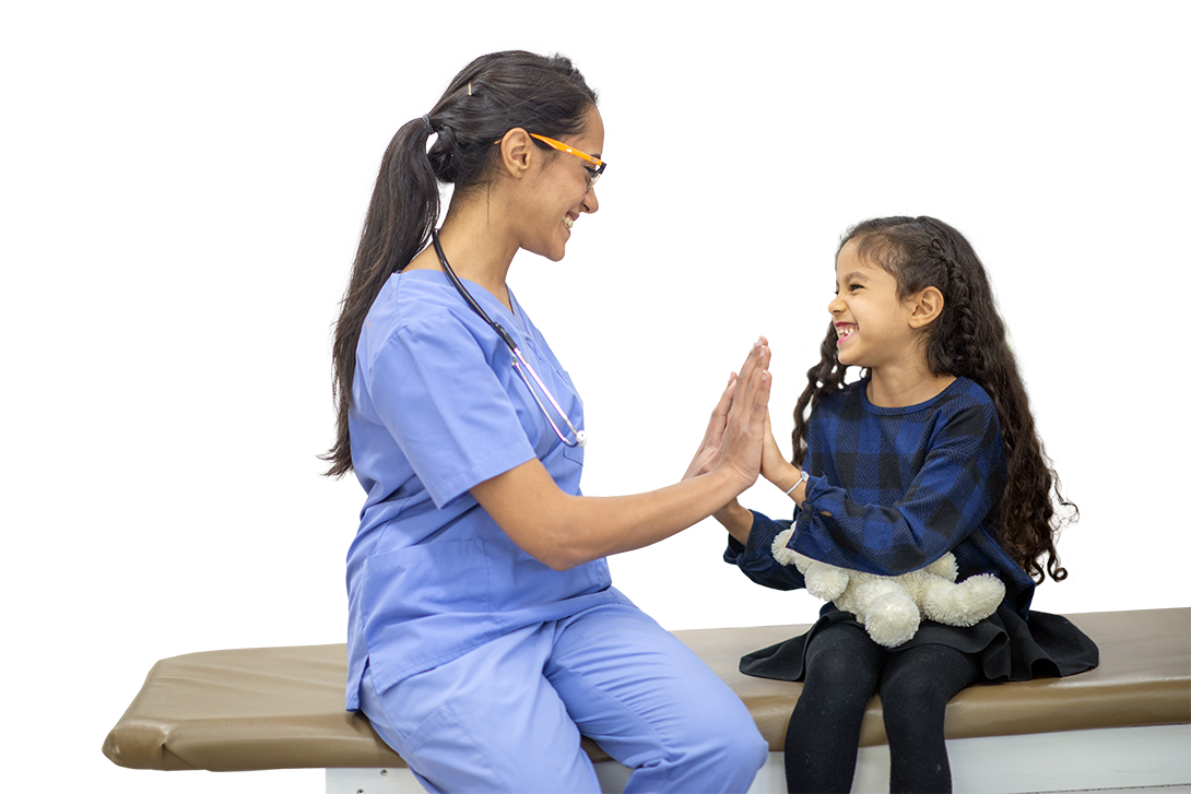 Photo of a nurse giving a high five to a young patient.